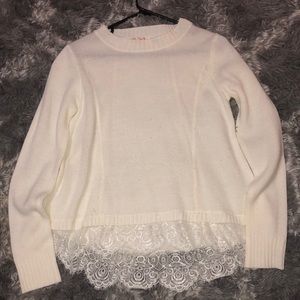 off white sweater with laced bottom